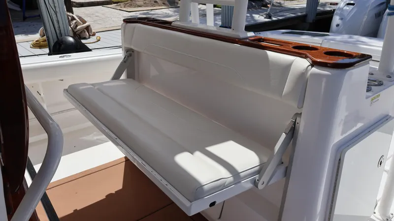  Yacht Photos Pics 2019 Everglades 435 Center Console boat with foldable white bench seat.