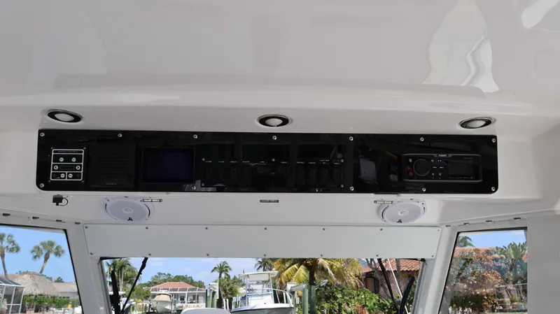  Yacht Photos Pics 2019 Everglades 435 Center Console dashboard with control panel and speakers.