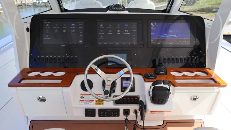  Yacht Photos Pics 2019 Everglades 435 Center Console boat dashboard with advanced navigation displays and controls.