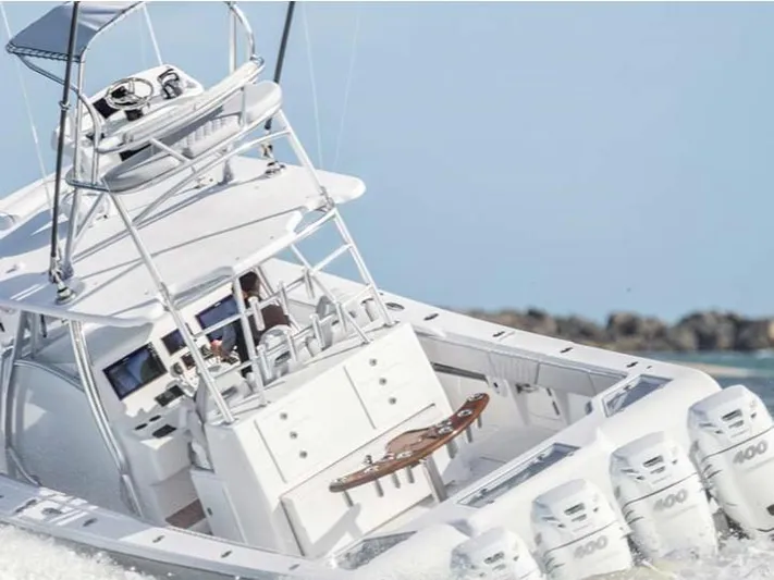  Yacht Photos Pics 2026 Front Runner 39 CC Custom boat with multiple engines cruising on water.