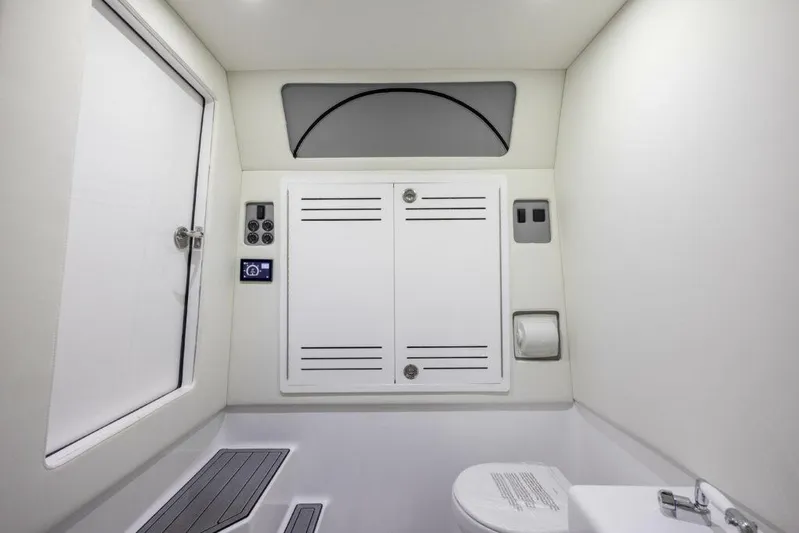  Yacht Photos Pics 2024 Front Runner 39 CC Custom boat bathroom with modern amenities.