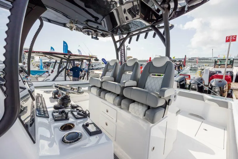  Yacht Photos Pics 2024 Front Runner 39 CC Custom boat interior with luxury seating and advanced controls.