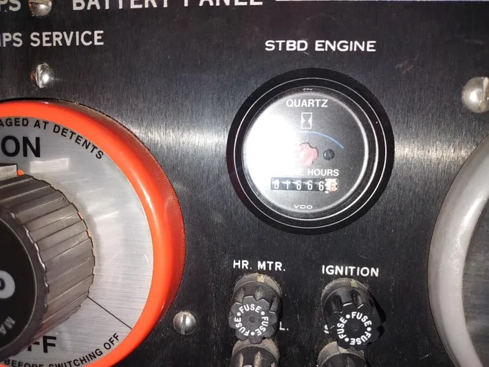  Yacht Photos Pics Close-up of 1995 Hatteras 52 Cockpit Motor Yacht engine hour meter panel.