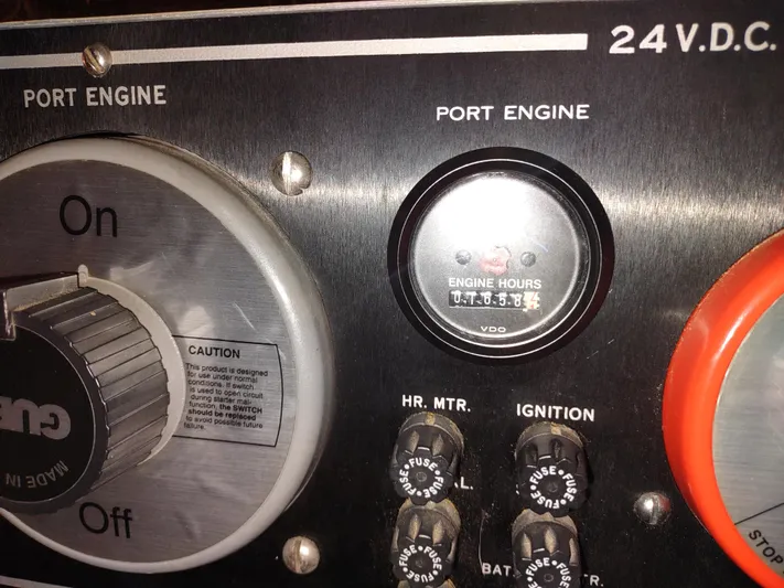  Yacht Photos Pics Control panel of a 1995 Hatteras 52 Cockpit Motor Yacht showing port engine details.