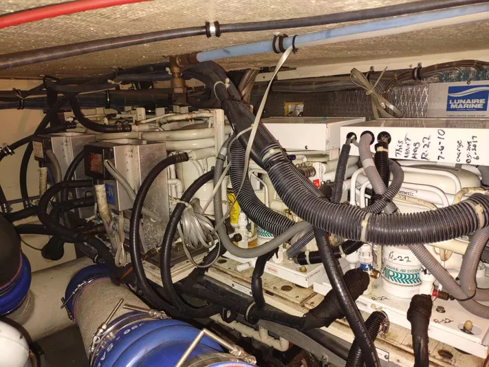  Yacht Photos Pics Engine room of 1995 Hatteras 52 Cockpit Motor Yacht with complex wiring and machinery.