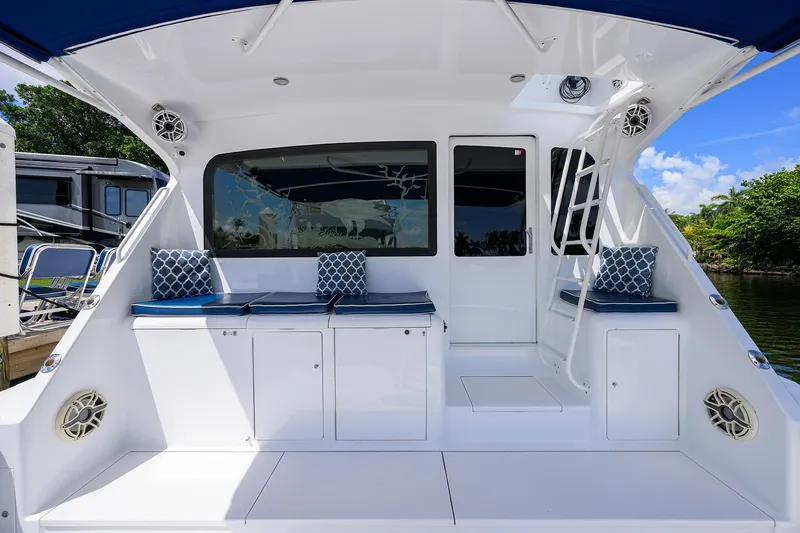  Yacht Photos Pics 2001 Viking 65 Enclosed Bridge yacht with spacious seating and modern design.