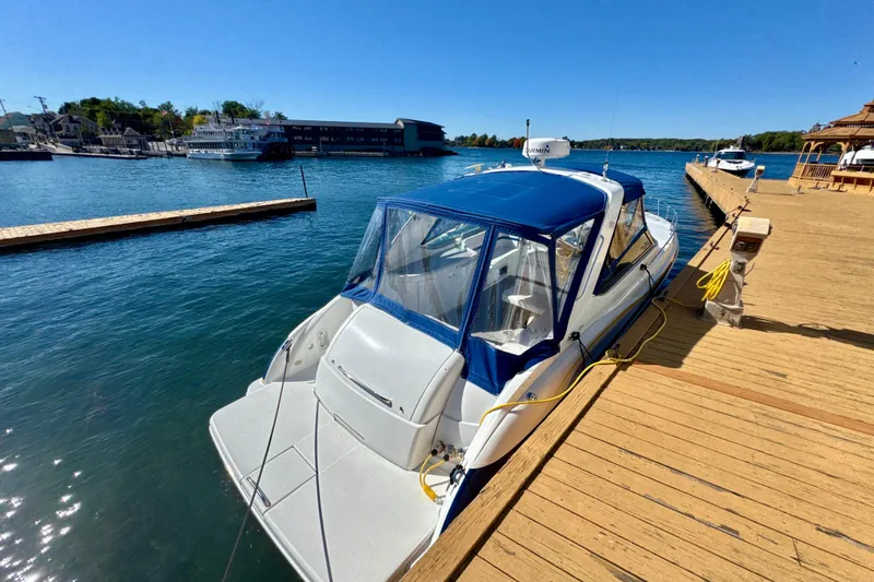  Yacht Photos Pics 2006 Formula 370 Super Sport boat docked at a sunny marina.