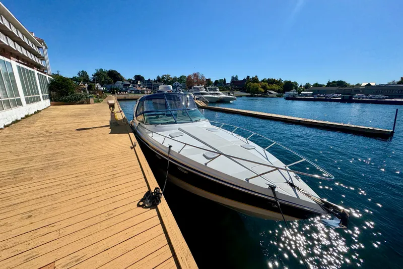  Yacht Photos Pics 2006 Formula 370 Super Sport docked at a sunny marina.