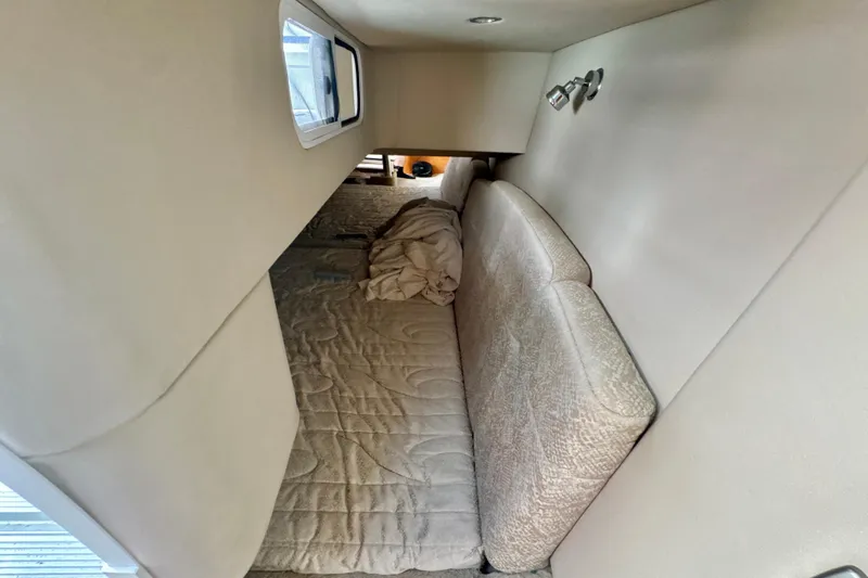  Yacht Photos Pics Interior cabin of 2006 Formula 370 Super Sport with cozy bed and window.