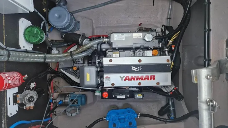  Yacht Photos Pics Engine compartment of a 2022 Bali 4.6 with Yanmar engine and various components.