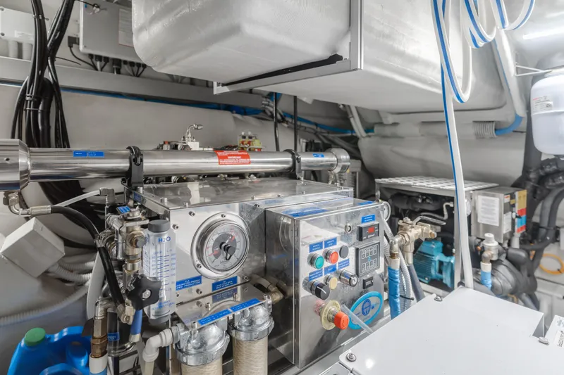 Mrs. Nicely Yacht Photos Pics Engine room of a 2020 Riva Dolceriva yacht, showcasing advanced machinery and equipment.