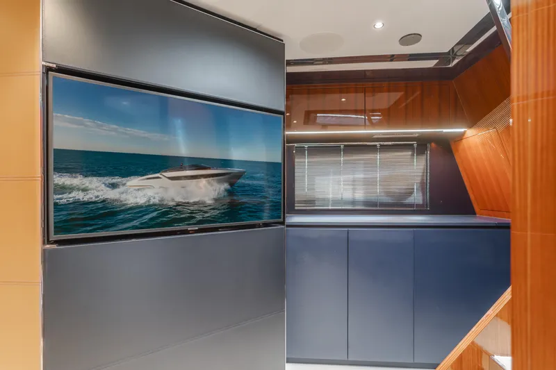 Mrs. Nicely Yacht Photos Pics Interior of 2020 Riva Dolceriva yacht with sleek modern design and ocean view artwork.