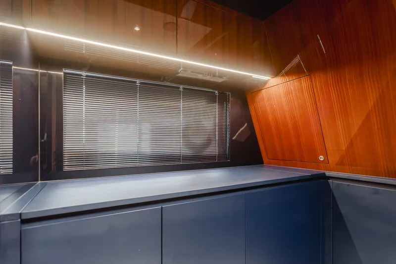 Mrs. Nicely Yacht Photos Pics Interior of 2020 Riva Dolceriva yacht with sleek wood and metal finishes.