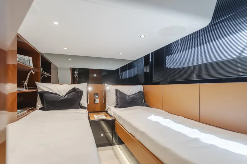 Mrs. Nicely Yacht Photos Pics Luxurious 2020 Riva Dolceriva cabin interior with twin beds and modern design.