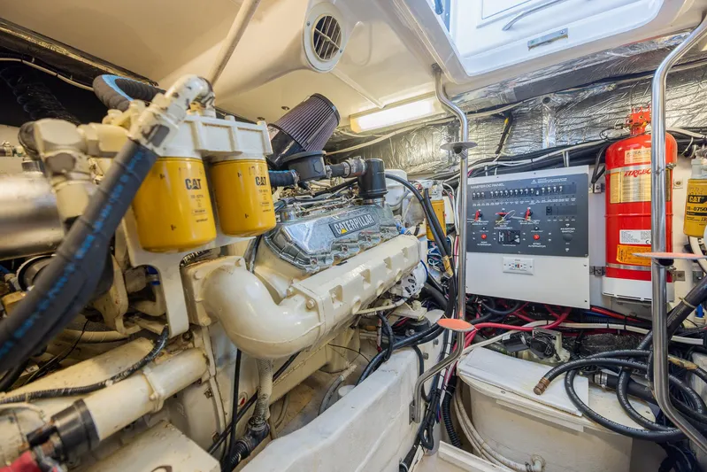 Mar's Bar Yacht Photos Pics Engine room of a 2000 Tiara Yachts Open model with CAT engine and control panel.