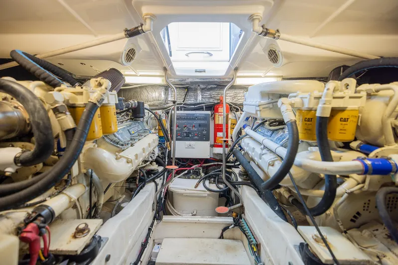 Mar's Bar Yacht Photos Pics Engine room of a 2000 Tiara Yachts Open model with dual engines.