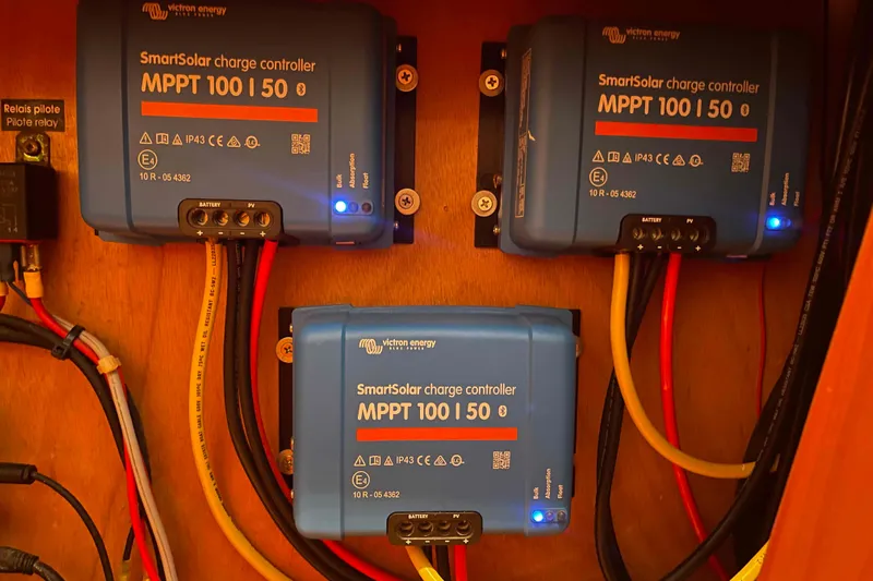 Acushla Yacht Photos Pics Three Victron Energy SmartSolar charge controllers installed on a Lagoon 410-S2, 2003 model.