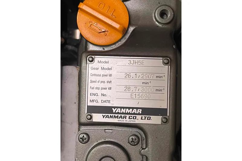 Acushla Yacht Photos Pics Yanmar engine label on a 2003 Lagoon 410-S2, model 3JH5E, with orange oil cap.