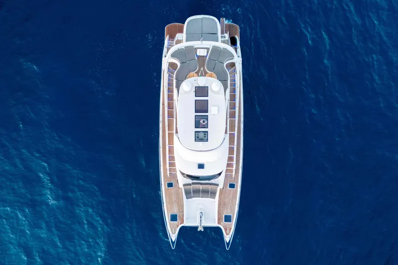 013 Yacht Photos Pics Aerial view of 2008 VG 62 yacht cruising on deep blue ocean waters.