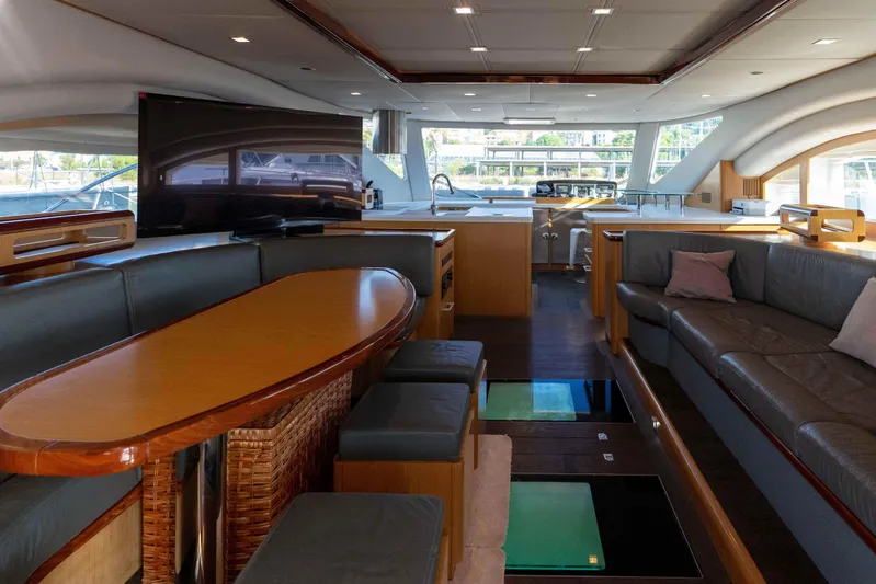 013 Yacht Photos Pics Luxurious yacht interior with modern seating, dining area, and large windows, VG 62 model, 2008.