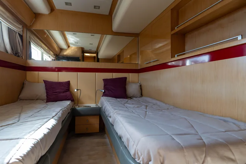013 Yacht Photos Pics Luxurious 2008 VG 62 yacht cabin with twin beds, wooden interior, and modern lighting.
