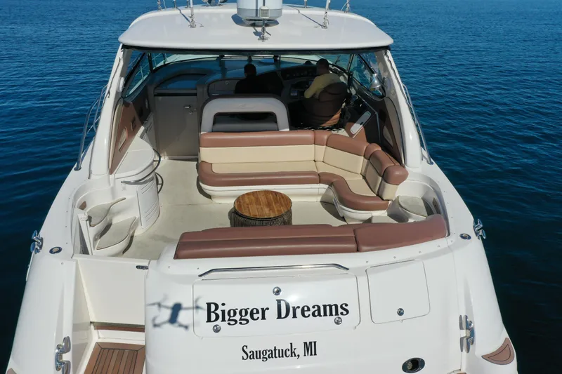  Yacht Photos Pics 2001 Sea Ray Sundancer 510 yacht on water, featuring spacious seating and "Bigger Dreams" name.
