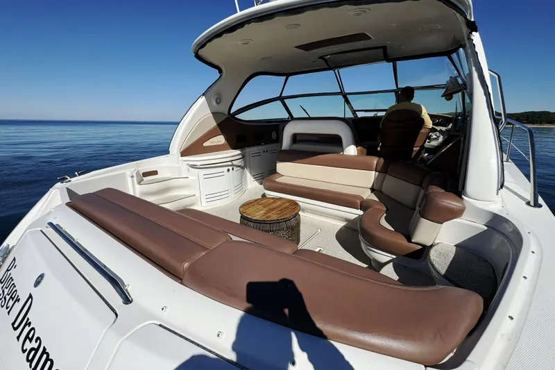  Yacht Photos Pics 2001 Sea Ray Sundancer 510 yacht with spacious seating on calm waters.