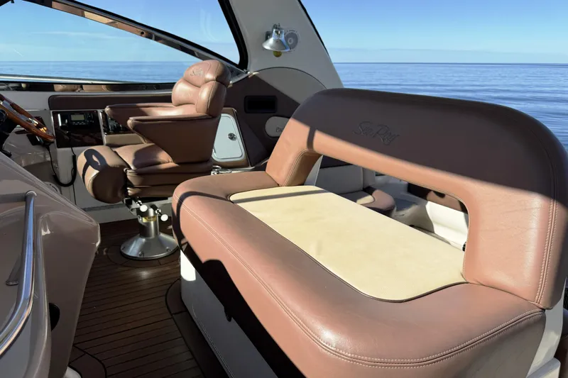  Yacht Photos Pics Luxurious interior of 2001 Sea Ray Sundancer 510 yacht with leather seating and ocean view.