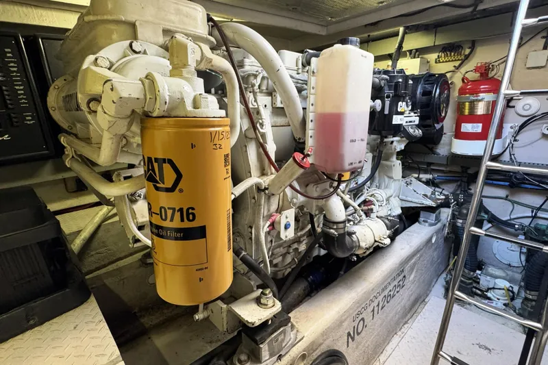  Yacht Photos Pics Engine room of a 2001 Sea Ray Sundancer 510 with visible CAT oil filter.
