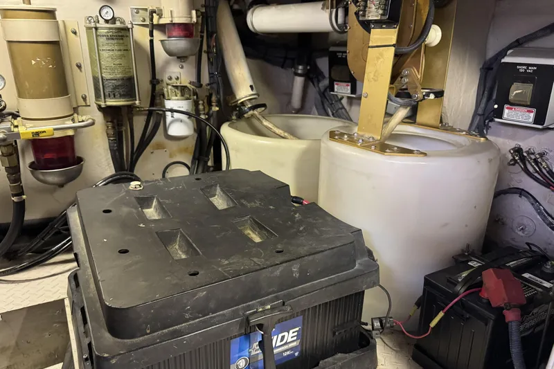  Yacht Photos Pics Engine room of a 2001 Sea Ray Sundancer 510 with batteries and fuel filters.