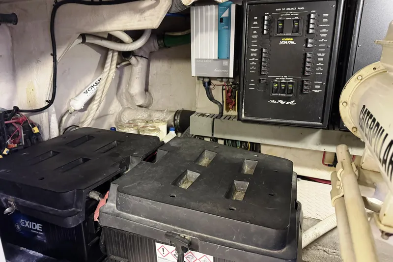  Yacht Photos Pics Engine room of 2001 Sea Ray Sundancer 510 with electrical panel and batteries.