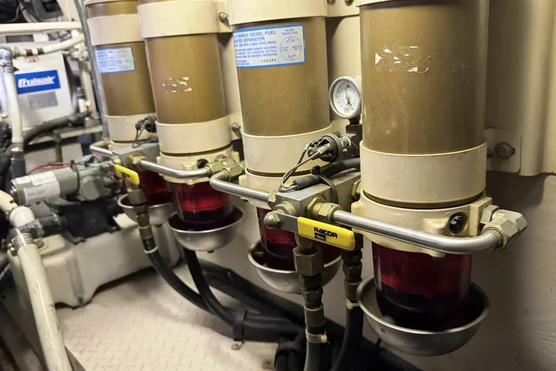  Yacht Photos Pics Engine room of 2001 Sea Ray Sundancer 510 with fuel filters and gauges.