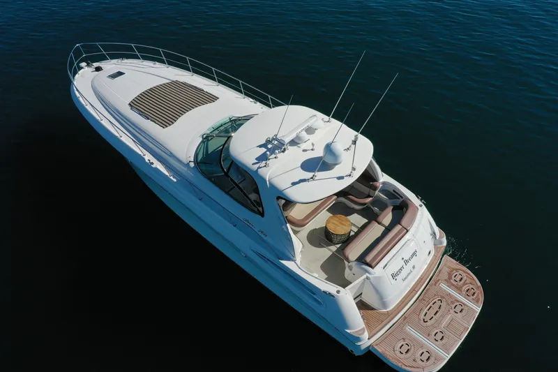  Yacht Photos Pics 2001 Sea Ray Sundancer 510 yacht on calm water, aerial view.