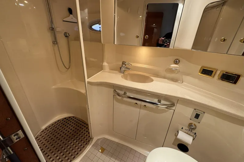  Yacht Photos Pics Luxurious bathroom in 2001 Sea Ray Sundancer 510 yacht with shower and vanity.