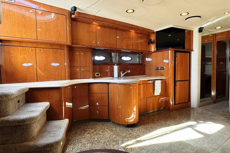  Yacht Photos Pics Luxurious 2001 Sea Ray Sundancer 510 yacht interior with elegant wood cabinetry and modern amenities.