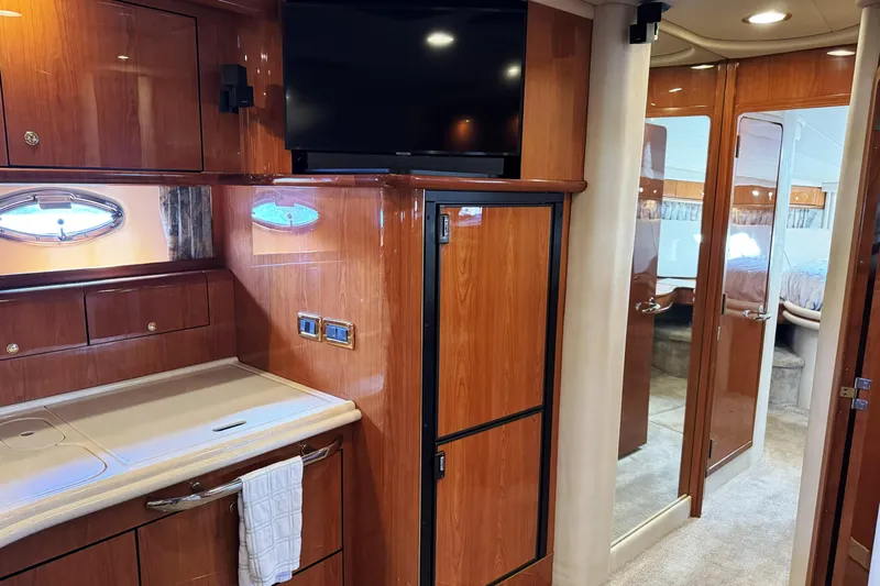  Yacht Photos Pics Luxurious 2001 Sea Ray Sundancer 510 yacht interior with wood cabinetry and modern amenities.