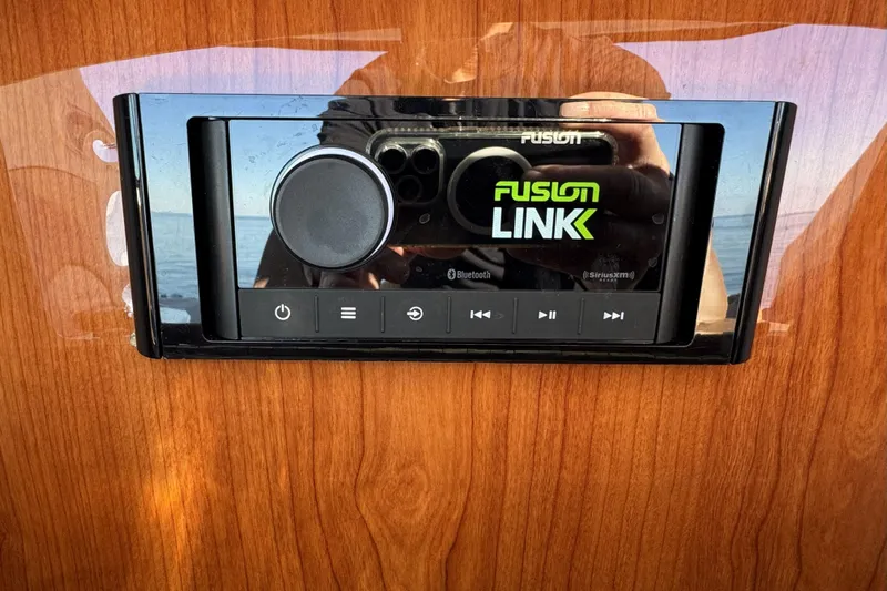  Yacht Photos Pics Fusion Link audio system on 2001 Sea Ray Sundancer 510 yacht, mounted on wooden panel.