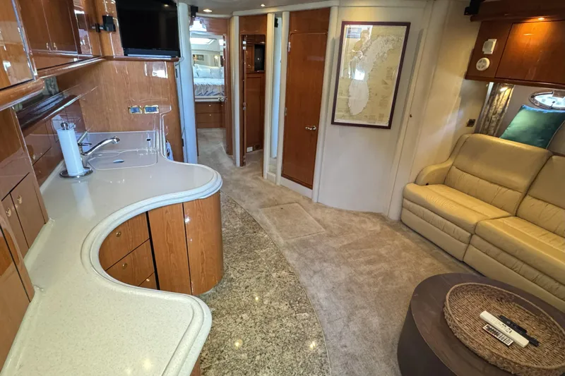  Yacht Photos Pics Luxurious interior of 2001 Sea Ray Sundancer 510 yacht with elegant furnishings and modern amenities.