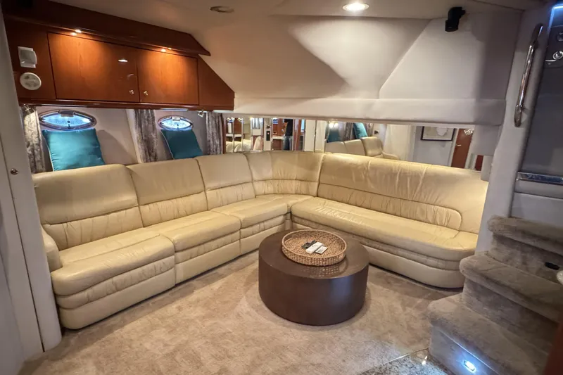  Yacht Photos Pics Luxurious interior of 2001 Sea Ray Sundancer 510 yacht with beige leather seating.