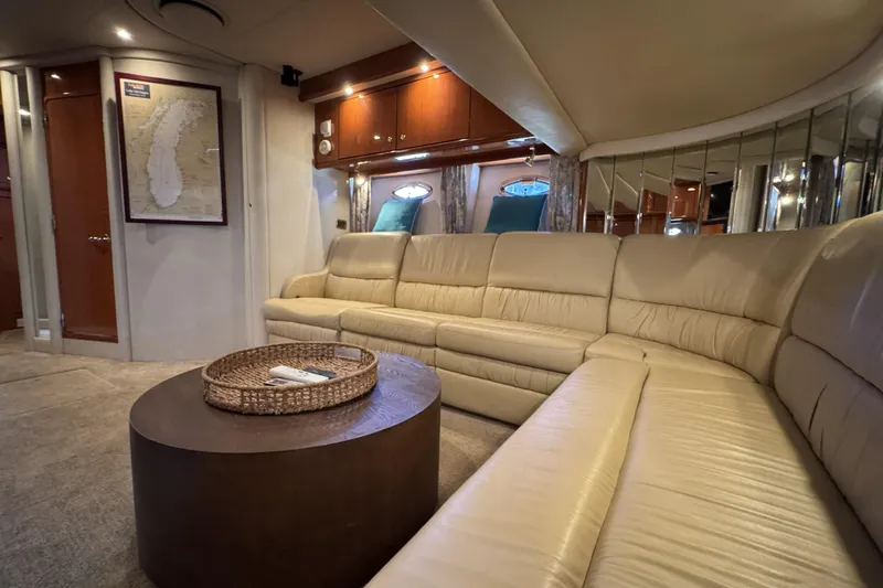  Yacht Photos Pics Luxurious interior of 2001 Sea Ray Sundancer 510 yacht with beige leather seating.