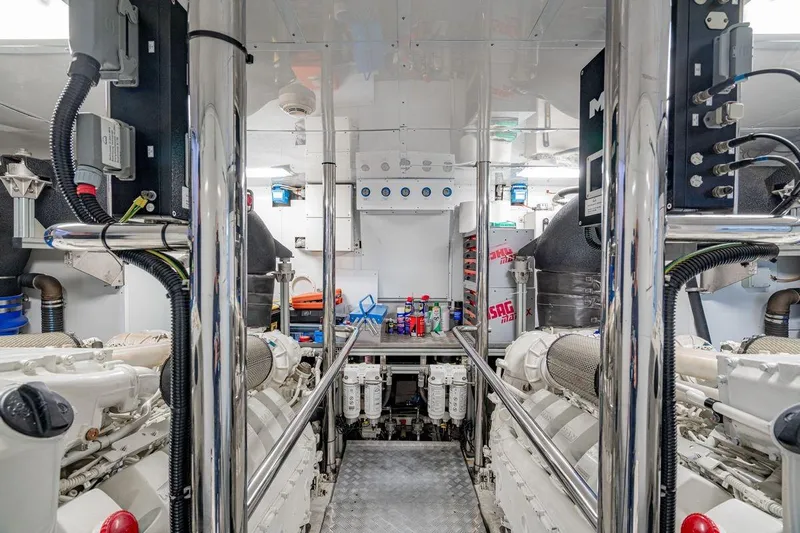 7 Seconds Yacht Photos Pics Engine room of a 2015 Dreamline 26 yacht, featuring modern equipment and organized layout.
