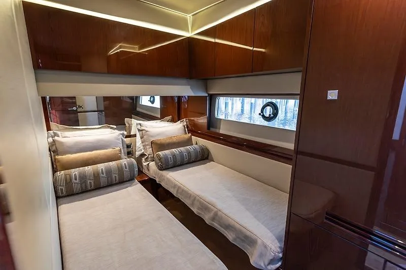 Caroline Kai Yacht Photos Pics Luxurious cabin interior of 2016 Sea Ray 510 Fly yacht with twin beds.