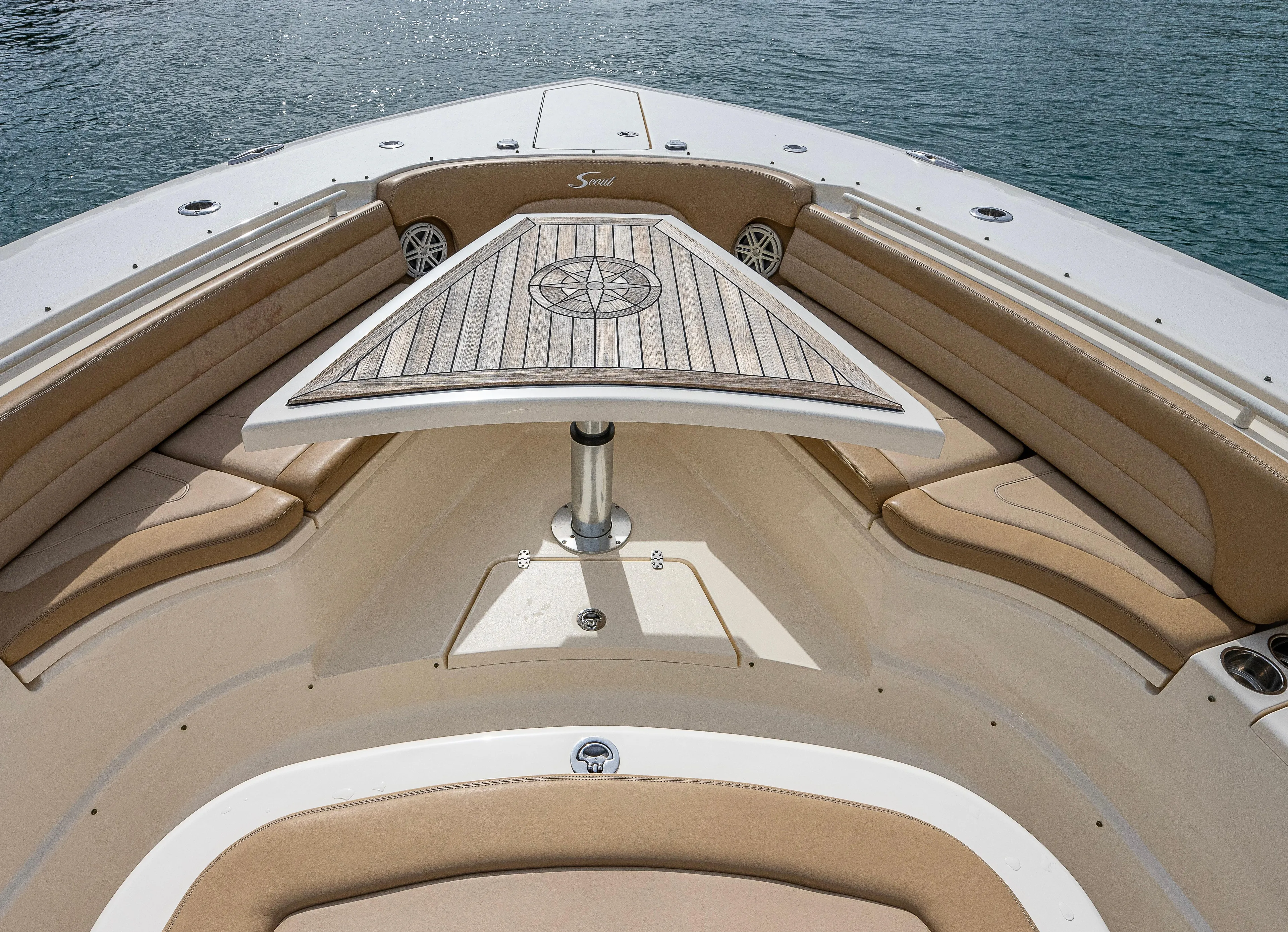  Yacht Photos Pics 2019 Scout 420 LXF boat interior with elegant seating and table.