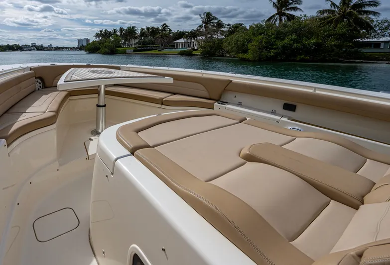  Yacht Photos Pics 2019 Scout 420 LXF boat interior with luxurious seating and scenic water view.
