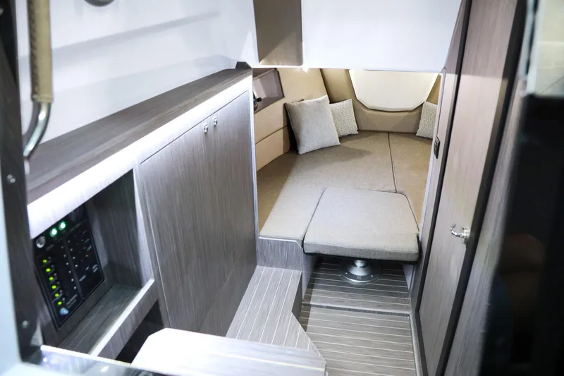  Yacht Photos Pics Interior of 2025 Ranieri NEXT 330 XL boat, featuring modern cabin design and comfortable seating.