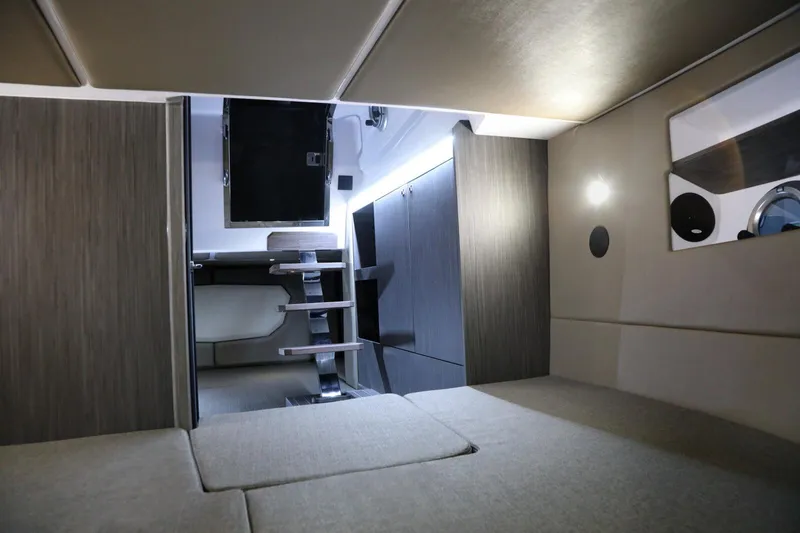  Yacht Photos Pics Interior cabin of 2025 Ranieri NEXT 330 XL boat, featuring modern design and comfortable seating.