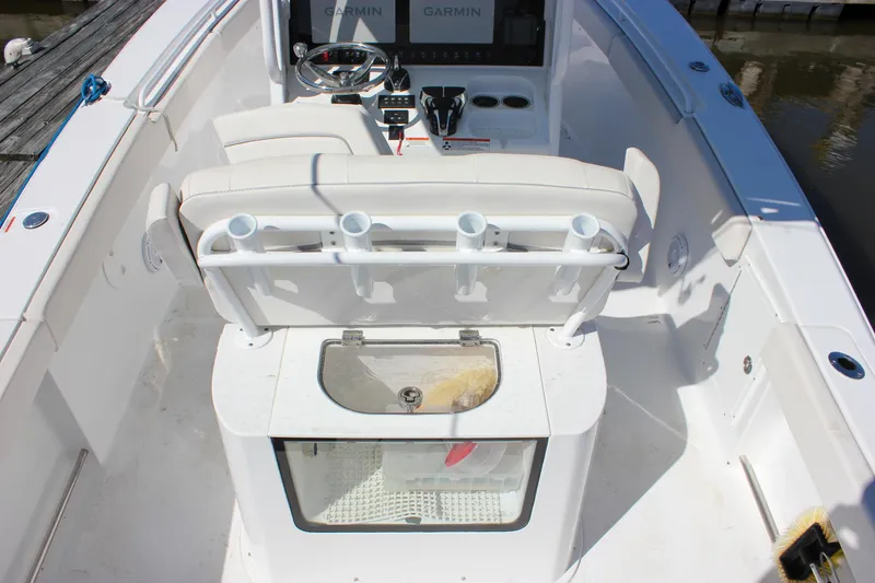  Yacht Photos Pics 2023 Sea Hunt Gamefish 27 boat interior with coffin box and rod holders.