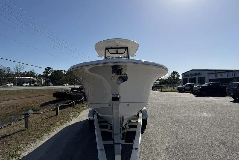  Yacht Photos Pics 2026 Sea Hunt Gamefish 27 boat on trailer in outdoor showroom.