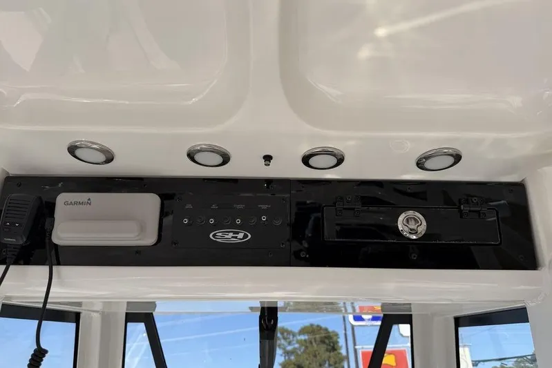  Yacht Photos Pics 2026 Sea Hunt Gamefish 27 dashboard with Garmin electronics and control panel.