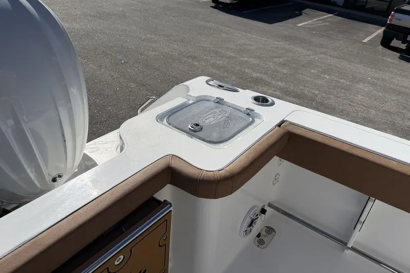  Yacht Photos Pics 2026 Sea Hunt Gamefish 27 boat interior with seating and storage features.